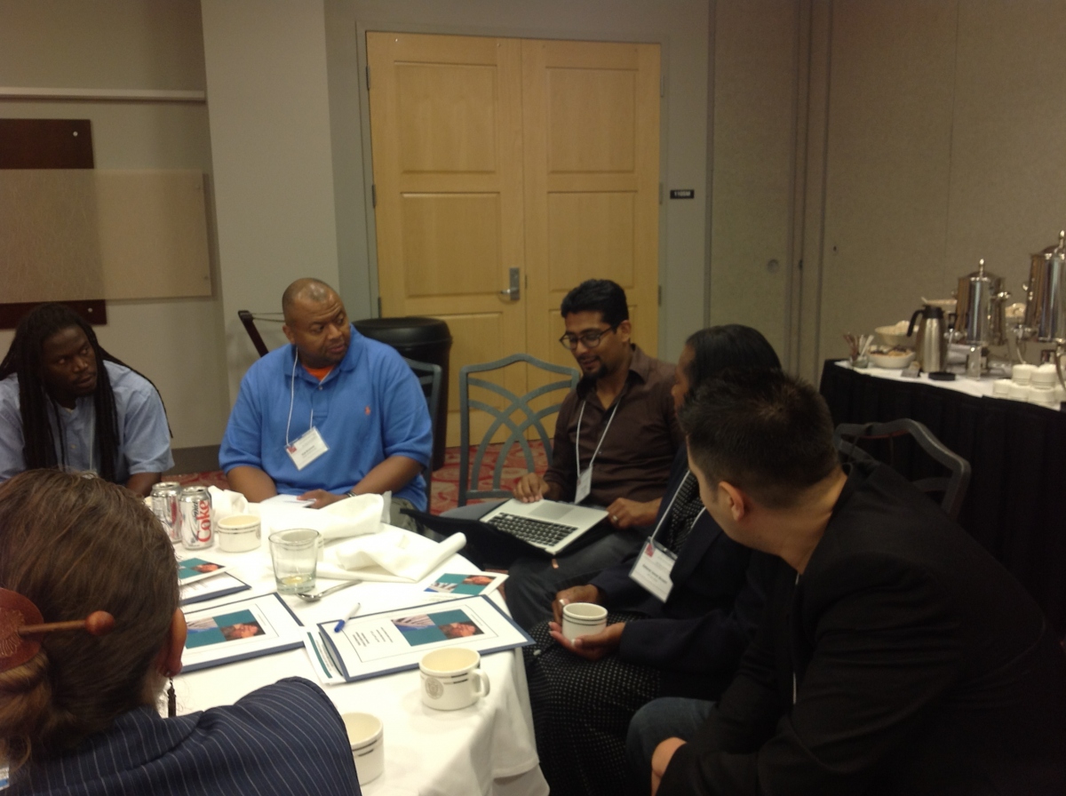Roundtable discussions. From L to R, facing: Brian Starks, Rod Brunson and Victor Rios