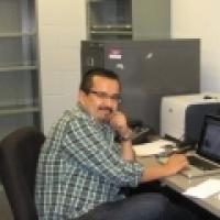 David Hernandez sitting at desk